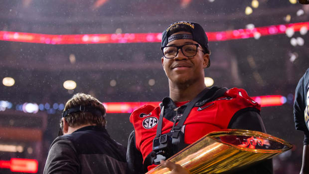 Georgia OL Nolan Smith celebrates the Bulldogs' second straight CFP National Championship